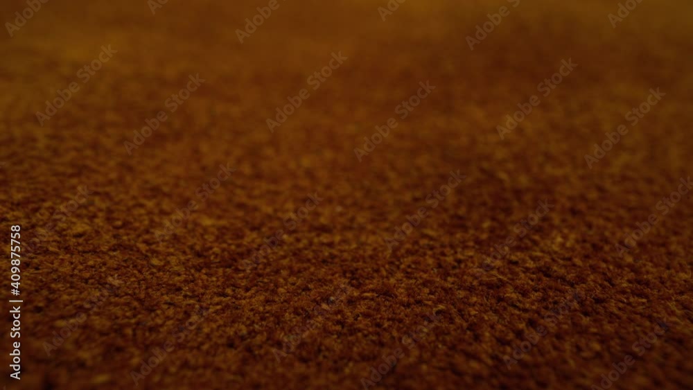 cow hide moving slowly over them in macro view.
