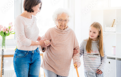 Fotografie Three generation of women supporting each other