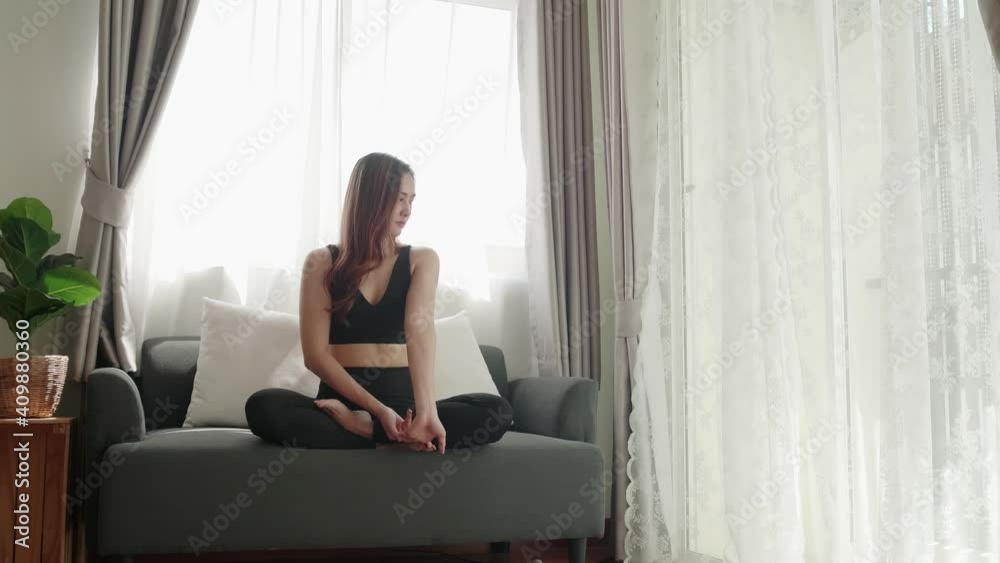 Sport women lovey with yoga exercise and stretching in the living room at home