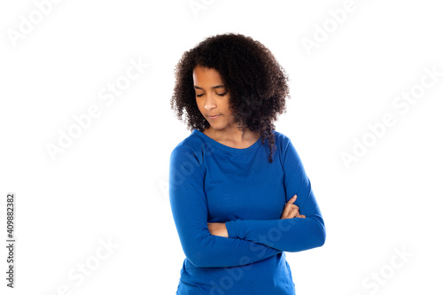 Teenager girl with afro hair wearing blue sweater