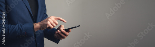 business man holding smart phone