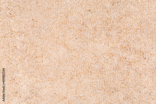 Fragment of sheet of undyed unbleached crepe paper, background, texture