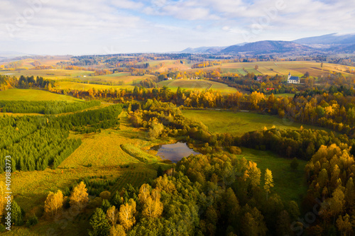 Picturesque autumn view with church on a hill. Czech Republic