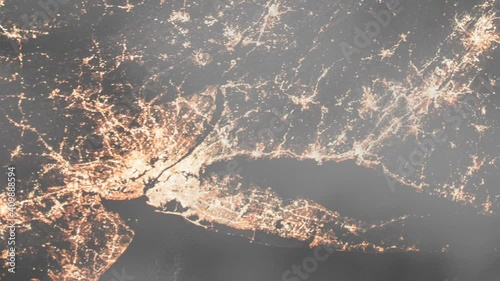 New York city view from space from a satellite during the night time.Contains public domain image by NASA.