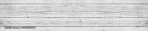 Wide wooden web banner background. Old black and white painted fence in good ...