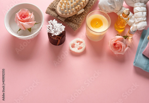 Natural skincare cosmetic products on pink pastel background. Soap, oils, sea salt. Organic cosmetics, spa concept. Empty space, flat lay, top view. © svetlana_nsk