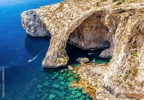 Tableau sur toile Blue Grotto sea cave in Malta, aerial view of natural limestone arch and turquoi