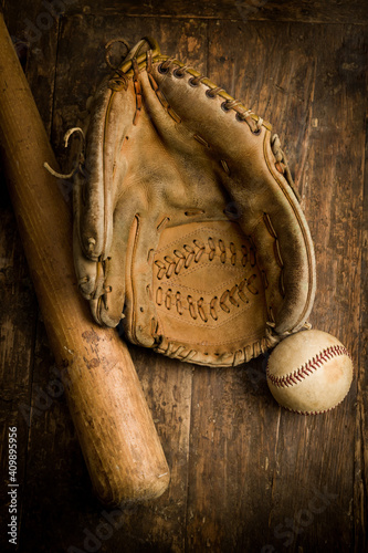 Photography Grungy old baseball gloves and ball
