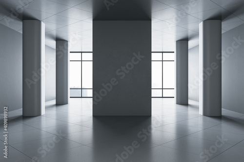 Exhibition room with columns  blank wall and city view