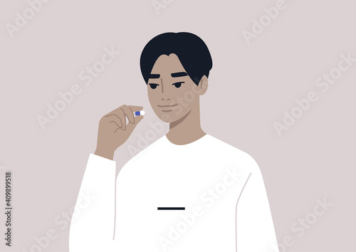 Medicine and healthy lifestyle concept, a young male Asian character taking a pill