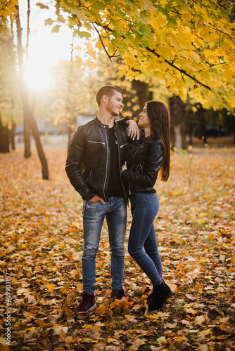 The guy with the girl lovers walk in the park autumn © prokop.photo