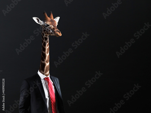 Businessman with head of Giraffe