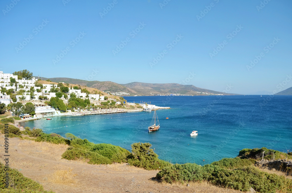 Beautiful Beach with Green Palms and Blue Sea  in Bodrum, Turkey. Luxury Resort, Travel and Vacation Concept