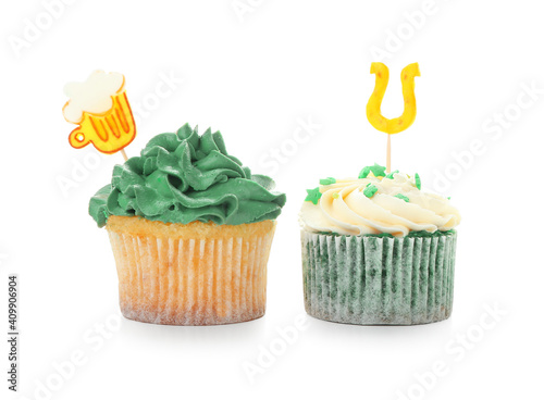 Fototapeta Naklejka Na Ścianę i Meble -  Tasty cupcakes for St. Patrick's Day on white background