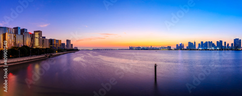 Modern city skyline and buildings in Hangzhou at sunrise,China.panoramic view.