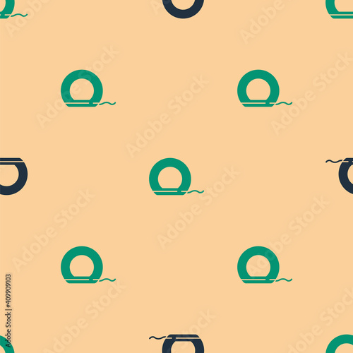 Green and black Dental floss icon isolated seamless pattern on beige background. Vector.