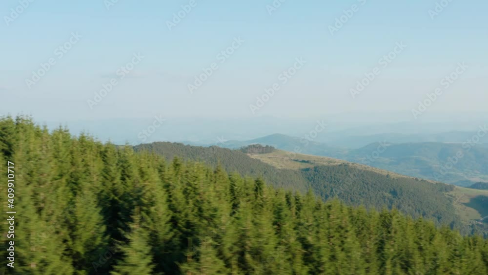 Astonishing beauty of green hills with evergreen forest on Golija mountain, Serbia. Aerial Astonishing beauty of green hills with evergreen forest on Golija mountain, Serbia. Aerial