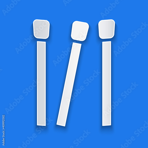 Paper cut Matches icon isolated on blue background. Paper art style. Vector.