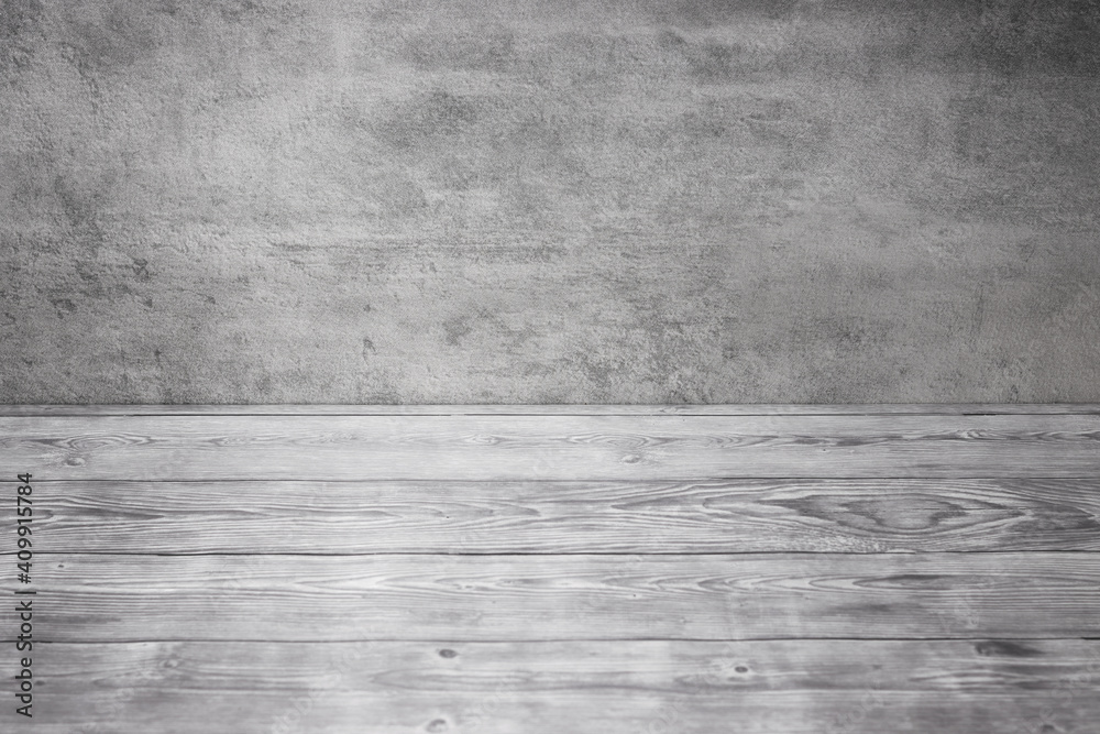 Gray studio backdrop. Wooden table and textured wall. Empty background texture. Gray studio backdrop. Wooden table and textured wall. Empty background texture.