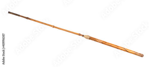 wooden pointer, old wood cane isolated on wooden background