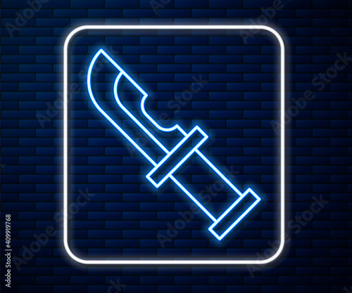 Glowing neon line Hunter knife icon isolated on brick wall background. Army knife. Vector.