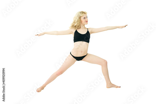 Slim woman in black underwear on white background