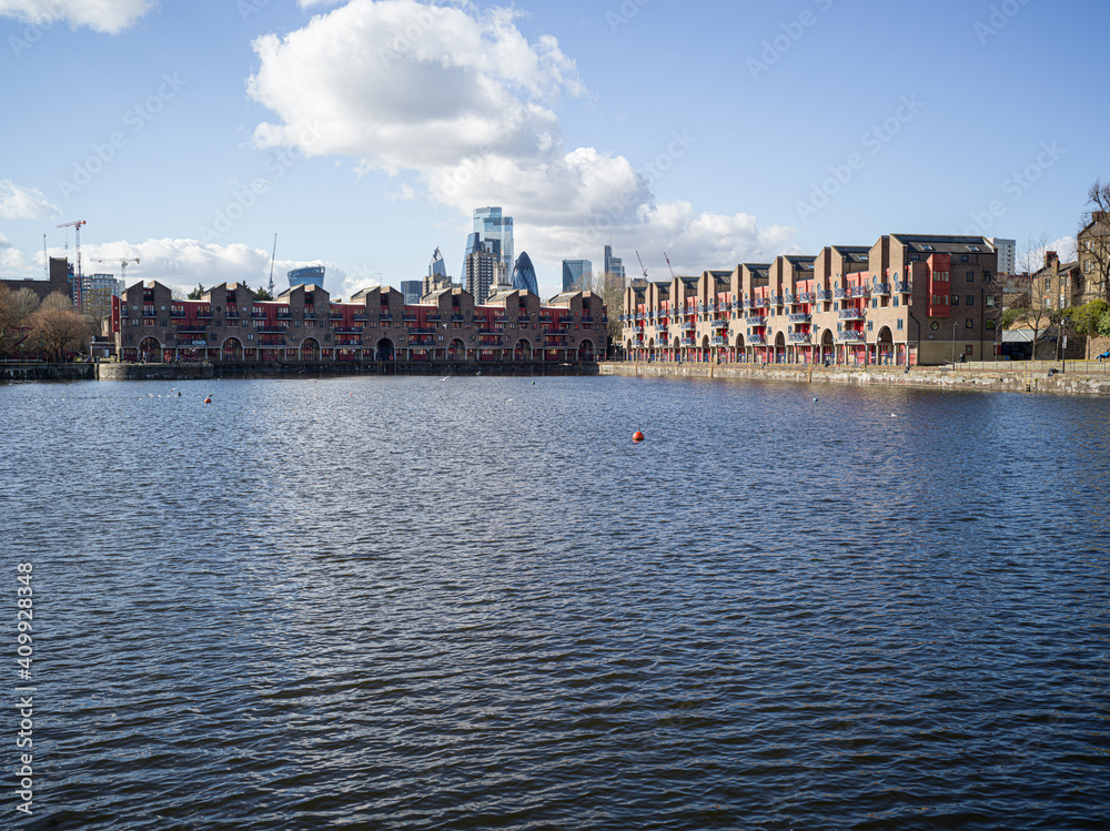 River Thames and Canary Wharf skyline, London, UK, dock
