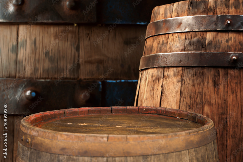 Fototapeta premium background of barrel and worn old table of wood