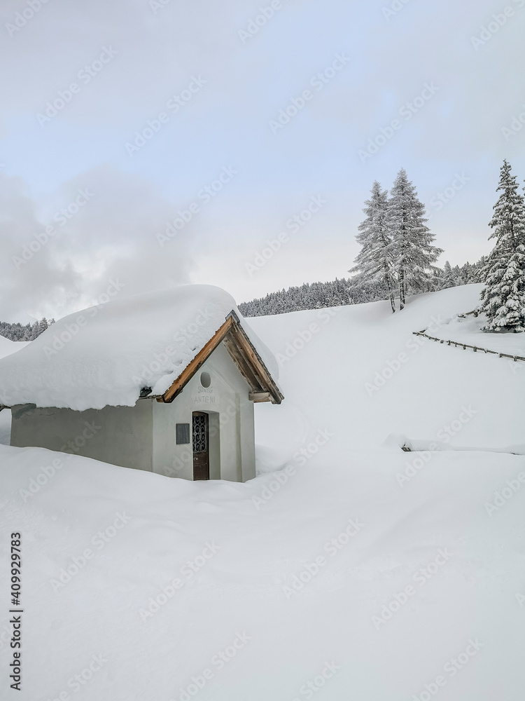 The chapel for St. Antonius during the ski touring in the mountains and forest above Alvaneu in the Swiss Alps The chapel for St. Antonius during the ski touring in the mountains and forest above Alvaneu in the Swiss Alps