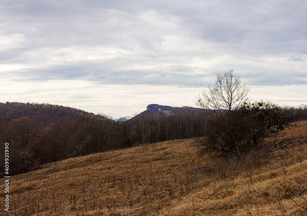 Autumn, the state of the weather before the onset of winter, a cloudy day in the mountains.