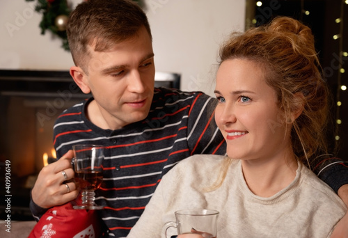Christmas Couple with mulled wine at home