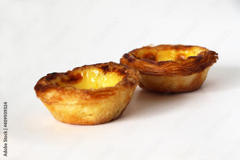 Portuguese custard pastry called a pasteis de nata isolated on white background Portuguese custard pastry called a pasteis de nata isolated on white background