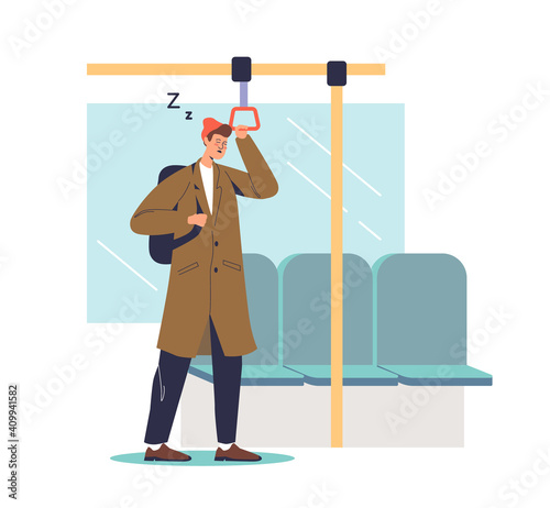 Tired man sleeping in subway carriage standing and holding on handrail
