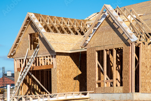 Tableau sur toile wall and rafters of a plywood house