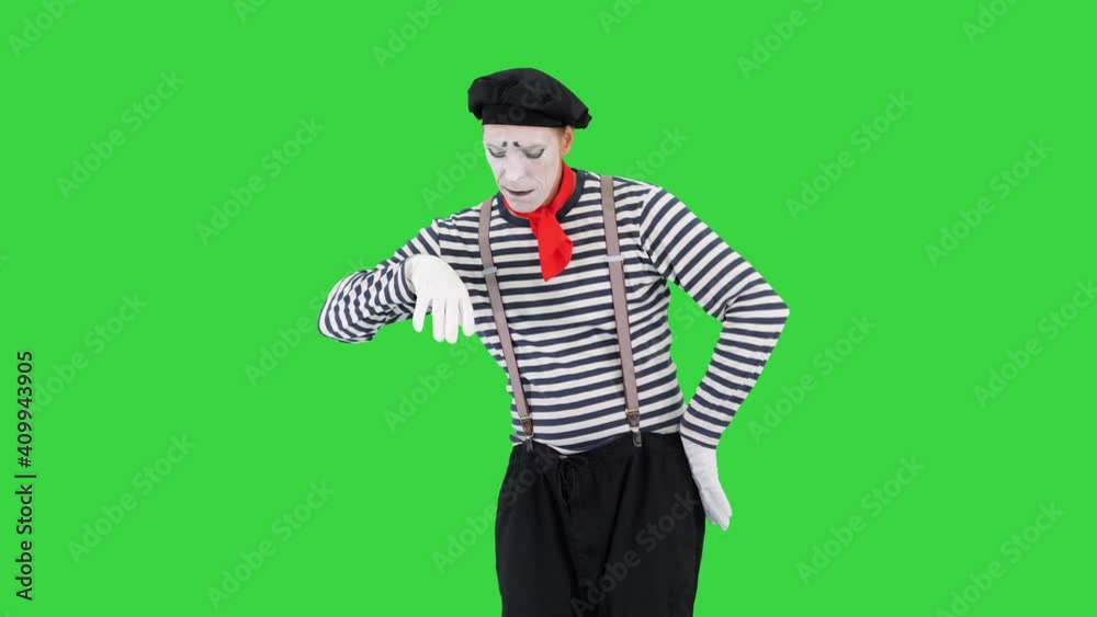 Mime pretending to be drunk having two shots of imaginary drink on a Green Screen, Chroma Key. Mime pretending to be drunk having two shots of imaginary drink on a Green Screen, Chroma Key.