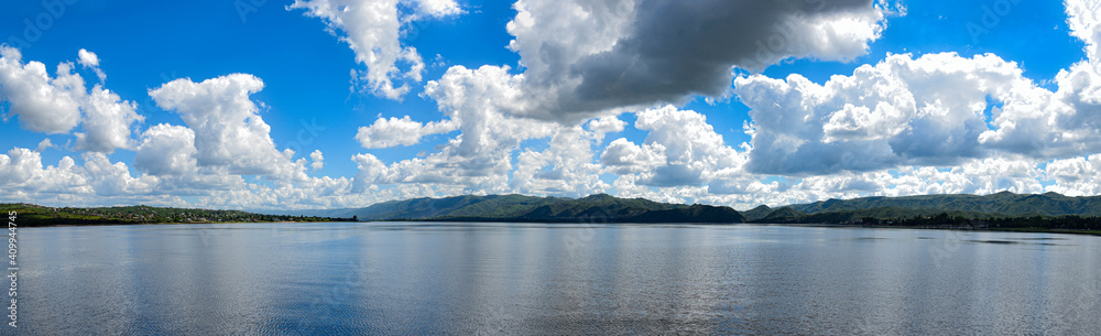 panoramic lake san roque villa Carlos paz with a wonderful blue sky and crystal clear water.