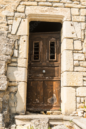 a wooden door in a wall © nounours1