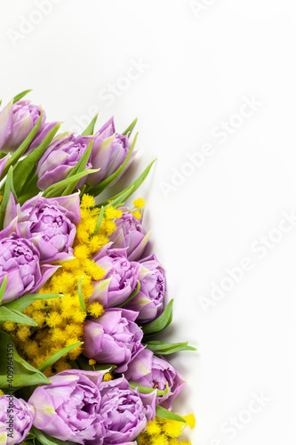 Wallpaper Mural Bouquet of lilac tulips and yellow mimosas on white background, copy space, side view, closeup. March 8, February 14, birthday, Valentine's, Mother's, Women's day celebration, spring concept Torontodigital.ca