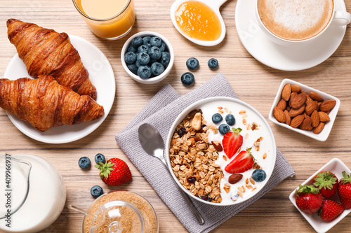 Bild auf Leinwand Buffet service. Tasty breakfast served on wooden table, flat lay