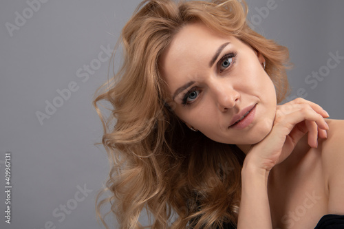 Portrait of pretty woman blonde hair, blue eyes