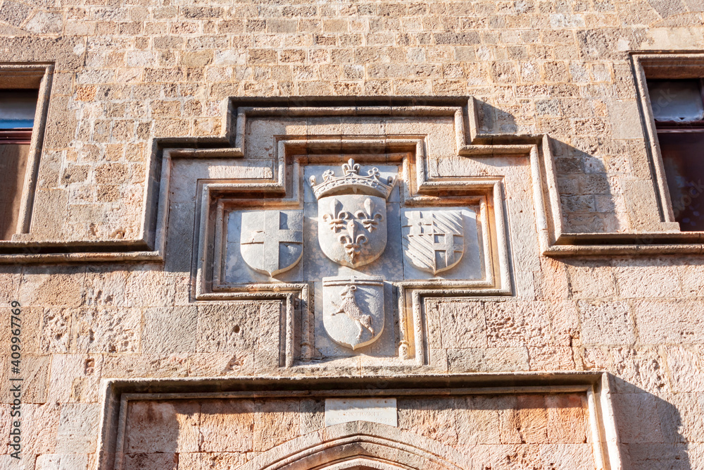Coats of arms on wall of Knight street on Rhodes old town, Greece Coats of arms on wall of Knight street on Rhodes old town, Greece