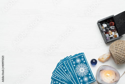 Tarot cards deck on the white table background.