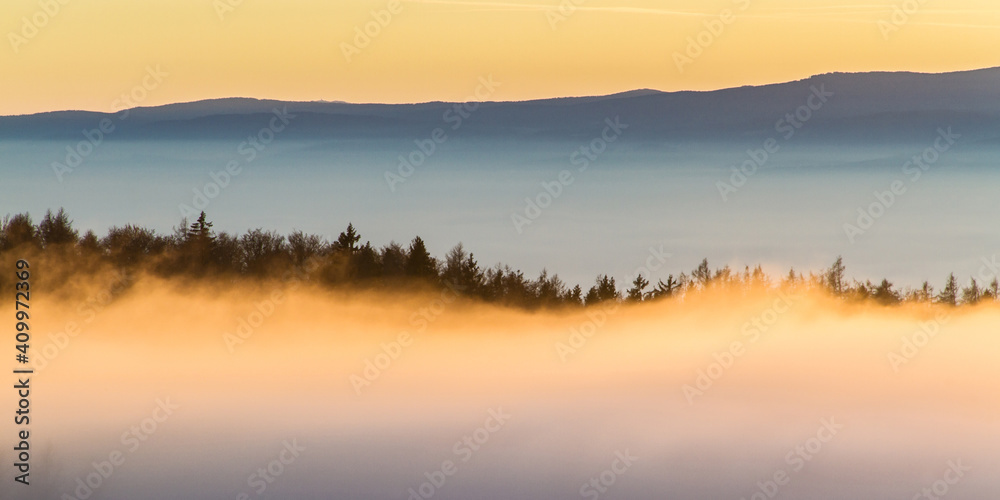 Sunset mood above the clouds