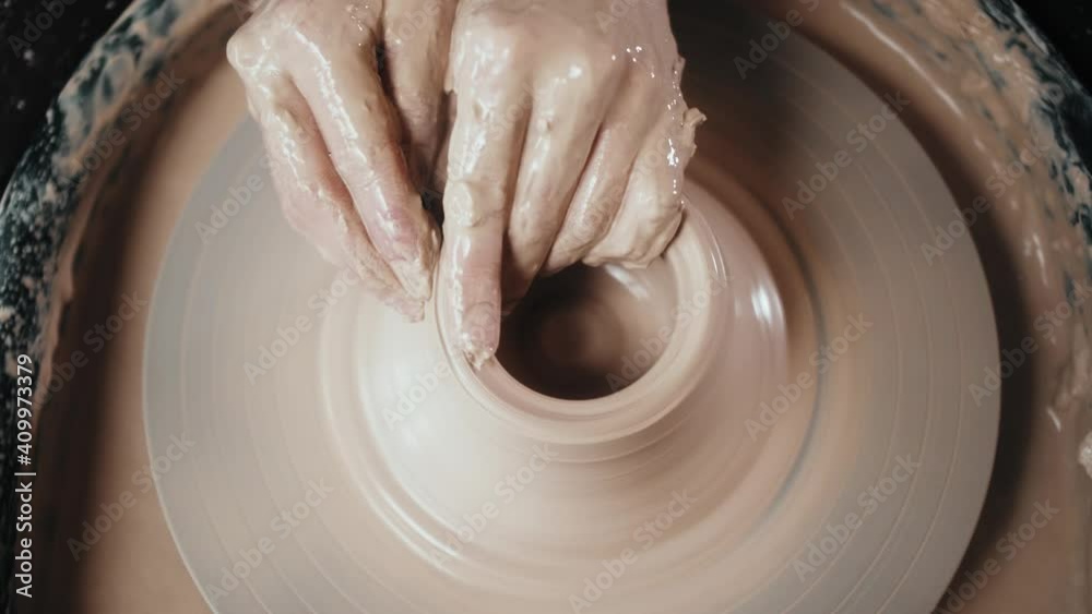 Close up of potter clay wheel, pottery workshop, woman making diy pot to sale in e-commerce store, home hobby