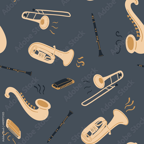 Seamless pattern with brass instruments, tube or trumpet, saxophone, pipe or flute, trombone and harmonica on dark blue background. Music Day. Vector musical instrument set. Doodle elements.