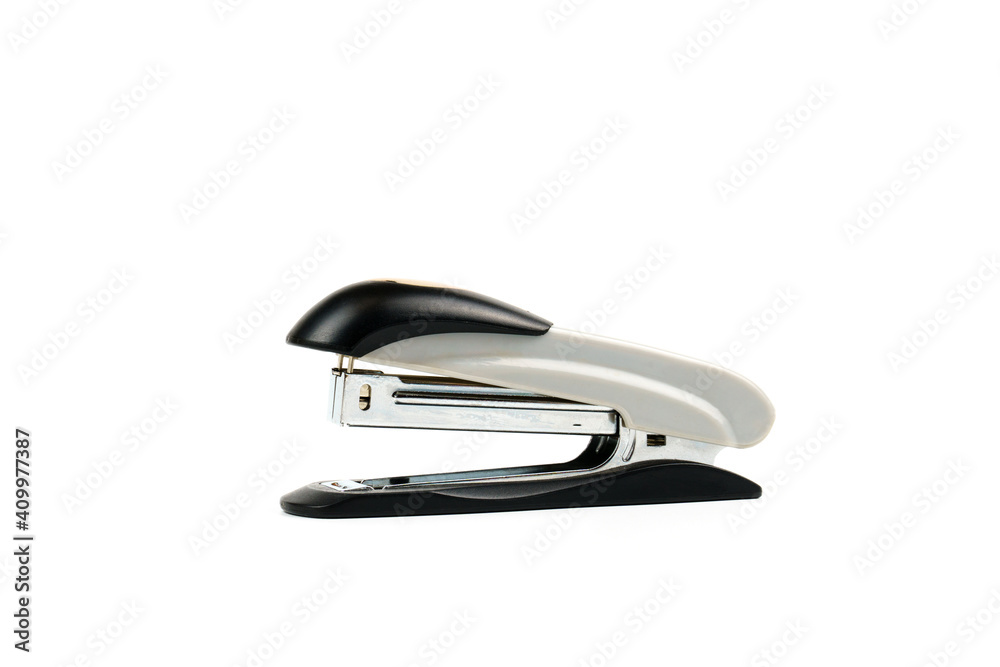 Gray paper stapler isolated on white background. Gray paper stapler isolated on white background.