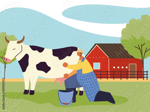 farm and agriculture farmer milks the cow