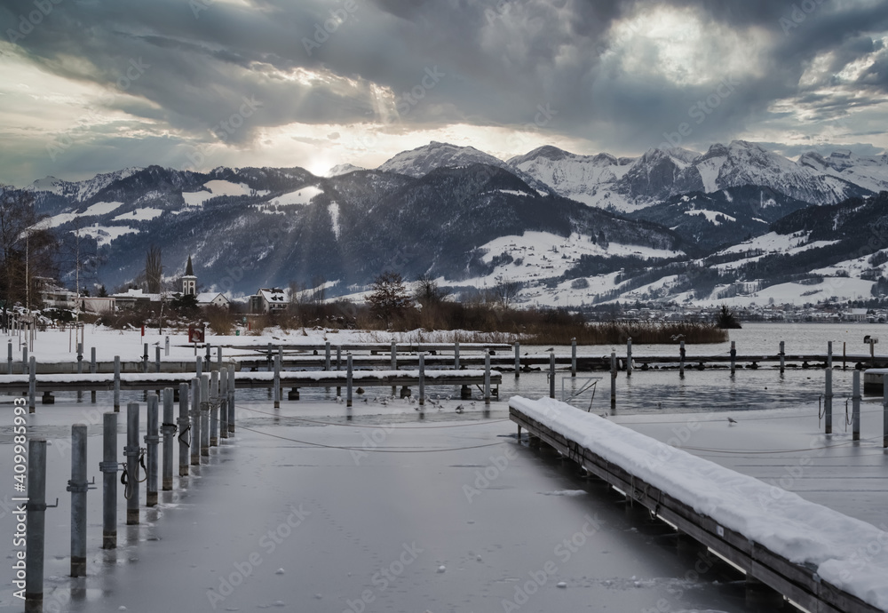 Stunning winter scenes along the shores of the Upper Zurich Lake (Obersee) near Rapperswil, St. Gallen, Switzerland