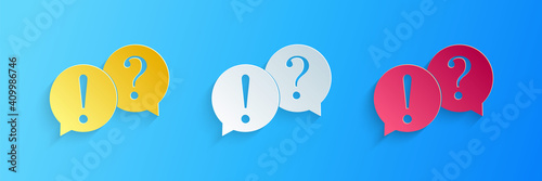 Slika na platnu Paper cut Speech bubbles with Question and Exclamation marks icon isolated on blue background