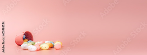 Photography Creative photo of easter eggs on colorful background.